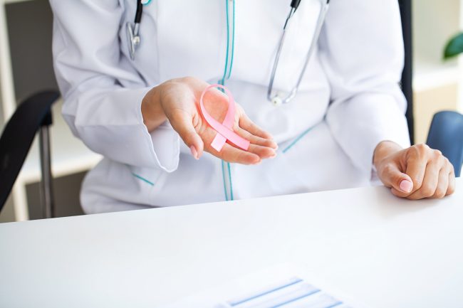 pink-ribbon-for-breast-cancer-awareness-in-doctor-2024-01-09-19-07-06-utc-min