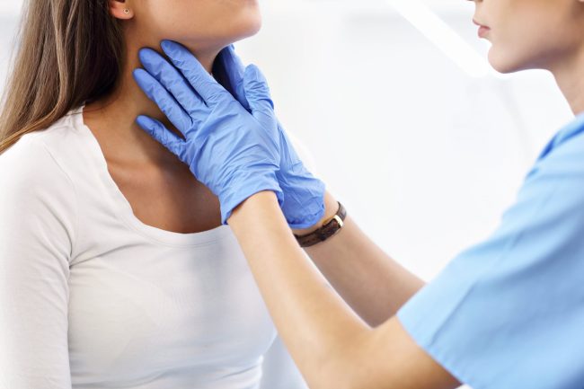 adult-woman-having-a-visit-at-female-doctor-s-offi-2025-01-08-15-15-13-utc-min